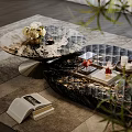 Elegant Marble Coffee Table With Floral Bouquet Books And Candle Tray In Modern Living Space