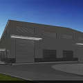 White Industrial Warehouse With Corrugated Metal Exterior Stone Base Windows Green Trees And Blue Sky