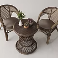 Wicker Furniture Set With Two Chairs Round Table And Potted Plants