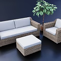 Rattan Sofa Coffee Table Combination with White Cushions and Matching Chair and Green Decorative Plant