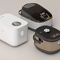 Modern Kitchen Appliances Featuring Rice Cookers With Three Different Styles And Colors