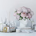 Stylish Modern Bathroom Accessories With Scented Sticks Skincare Bottles And Pink Peonies