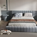 Modern Kids Bed With Grey Upholstered Headboard Striped Quilt Pillows And Toy Car