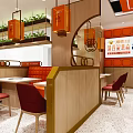 Vibrant Orange Noodle Restaurant With Handmade Noodles And Cozy Interior