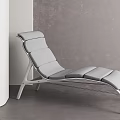 Modern Gray Lounge Chair With Metal Frame In Indoor Minimalist Setting