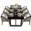 Elegant Dining Table Set With Upholstered Chairs Plates Glasses And Floral Centerpiece