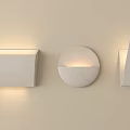 Three Modern Wall Lamps With Different Shapes Illuminated On Beige Wall 3d model