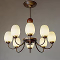 Vintage Chandelier With Multiple Frosted Glass Shades And Brass Frame Accents