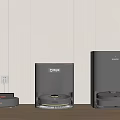 CMRIE Gray Cleaning Robots In Different Sizes On Wooden Floor With White Tile Wall