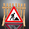 Road Work Warning Sign Featuring Shoveling Man Symbol And Wooden Barrier