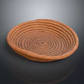 Brown Woven Basket Plate With Spiral Pattern For Home Decoration