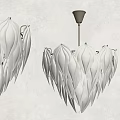 White Leaf Shaped Chandelier with Metal Base in Gray Wall Interior