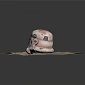 Two Stylish Helmets Metallic Silver And Pink Weathered Design On Sandy Base