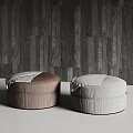 Modern Stylish Brown and Gray Upholstered Ottomans Against Dark Wooden Wall
