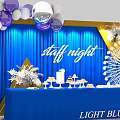 Delicious Cakes and Pastries on Dessert Table for Staff Night with Blue Backdrop and Balloon Decorations