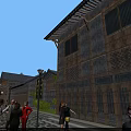 Traditional Commercial Street Featuring Wooden Architecture Lattice Windows Street Lamps and Evening Pedestrians