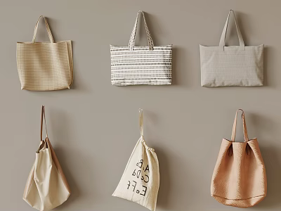 Stylish Tote Bags with Various Designs Hanging on Beige Wall 3d model