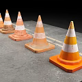 Orange And White Traffic Cones As Road Safety Facilities On Asphalt Surface
