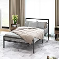 Modern Metal Frame Double Bed With Pillows Quilt Nightstands And Natural Light