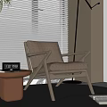 Modern Brown Leisure Chair With Wooden Frame Side Table And Potted Plant Near Floor Lamp And Bookshelf