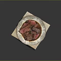 Sliced Juicy Steak With Rich Sauce On Decorative Plate And Bamboo Mat