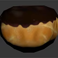 Freshly Baked Chocolate Eclair With Cream Filling Golden Pastry And Smooth Glaze