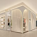 Modern Fashion Clothing Store with Window Display Mannequins Transparent Curtains and Circular Decorations