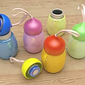 Colorful Stainless Steel Cups With Lanyards On Wooden Table