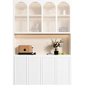 White Sideboard With Toaster Vase Flowers And Green Fruits Glass Door Shelves Above
