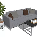 Gray Multi Seat Sofa With Mixed Color Cushions And Black Coffee Table In Living Room