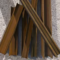 Old Rusted Brown Metal Strips Stacked On Rough Concrete Background Surface