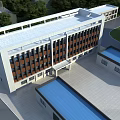 Industrial Factory With Blue Roofs Surrounded By Green Trees And Access Road With Trucks