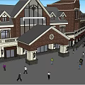 Red Brick Commercial Street With Clock Tower Arched Entrance And Pedestrian Activity