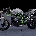 Sleek Sporty Motorcycle With Gray Green Accents Aerodynamic Bodywork Single Seat And Black Wheels