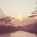 Scenic Misty Mountain Landscape With Sunlit Pine Trees And Calm Water Surface Reflection