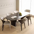 Oval Dark Wooden Dining Table With Six Gray White Chairs Open Book And Fruit Bowl