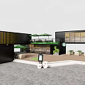 Modern Container Building Café With Black Exterior Large Windows Green Roof And Outdoor Seating