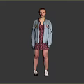 A Woman Wearing Blue Denim Jacket With Patches And Pink Floral Dress And White Sneakers