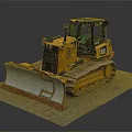 Yellow CAT Bulldozer With Tracked Undercarriage And Front Blade On Concrete Surface