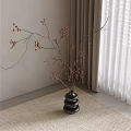 Decorative Black Stacked Vase With Red Berry Twigs Against Neutral Wall Natural Light Curtain Rug