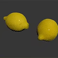 Two Fresh Ripe Yellow Lemons on Dark Surface with Shiny Reflections