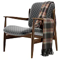Wooden Frame Leisure Chair With Gray Geometric Pattern Cushion And Plaid Fringe Blanket