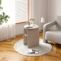 Modern Minimalist Side Table In Living Room With Grey Armchair Wooden Floor And Green Plant
