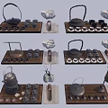 Various Traditional Tea Sets With Teapot Cups And Wooden Serving Trays