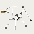 Stylish Modern Wall Lamps Featuring Curved Arms Round Bases And Gold Accents