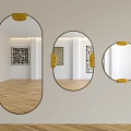 Decorative Mirrors With Gold Accents Oval And Round Shapes On Interior Wall With Wooden Floor