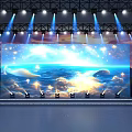 Stage with Purple Blue Lighting Large Screens Ocean Sky Scenes Reflective Floor and Lighting Equipment