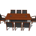 Long Wooden Conference Table With Eight Dark Upholstered Chairs For Meeting Room