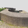 Historic Military Weapon Ancient Cannon on Circular Stone Platform With Stone Walls and Green Plants