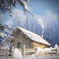 Serene Winter Landscape With Snow Covered Log Cabin Smoking Chimney And Surrounding Trees